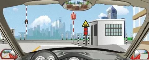 驶近一个图中所示的铁路道口时，只要看到栏杆还没放下来，就可以加速通过道口。