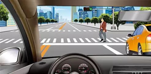 驾驶机动车在人行横道前遇到这种情况要停车让行。