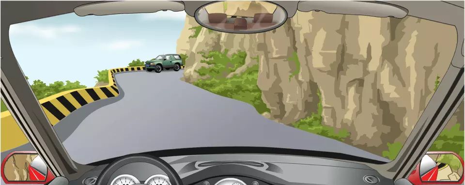 在这种山区危险路段怎样安全会车？