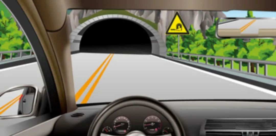 如图所示，以下交通标志提示驾驶人进入隧道应开启前照灯。