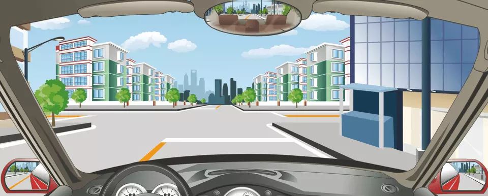 驾驶机动车直行通过前方路口怎样行驶？