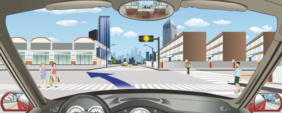 驾驶机动车此时可以加速通过路口。