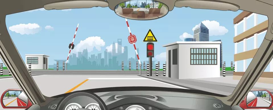 驾驶机动车通过这个铁路道口时要减速停车。