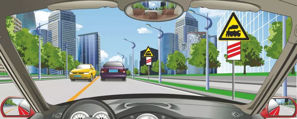 如图所示，右侧标志警告前方150米是无人看守铁路道口。