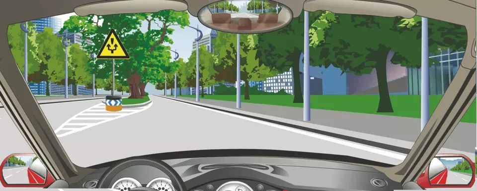 图中标志提醒障碍物在路中，车辆从两侧绕行。