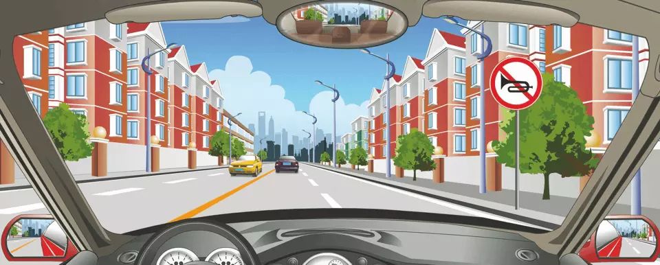 右侧标志表示不允许长时鸣喇叭。