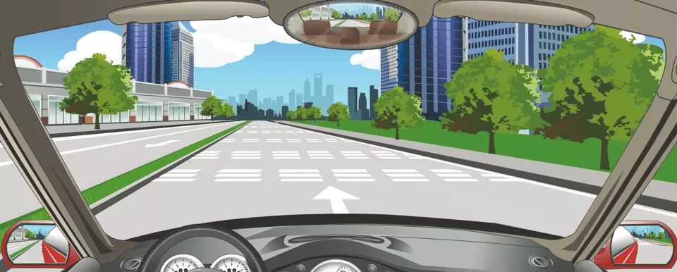 路面白色反光虚线警告前方路段要减速慢行。