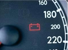 行车中，如图所示的报警灯常亮时，驾驶员应马上（ ）。