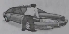 如图所示，驾驶员压动车辆前端一侧，若车身上、下振动（ ）后马上静止，表明减振器工作正常。